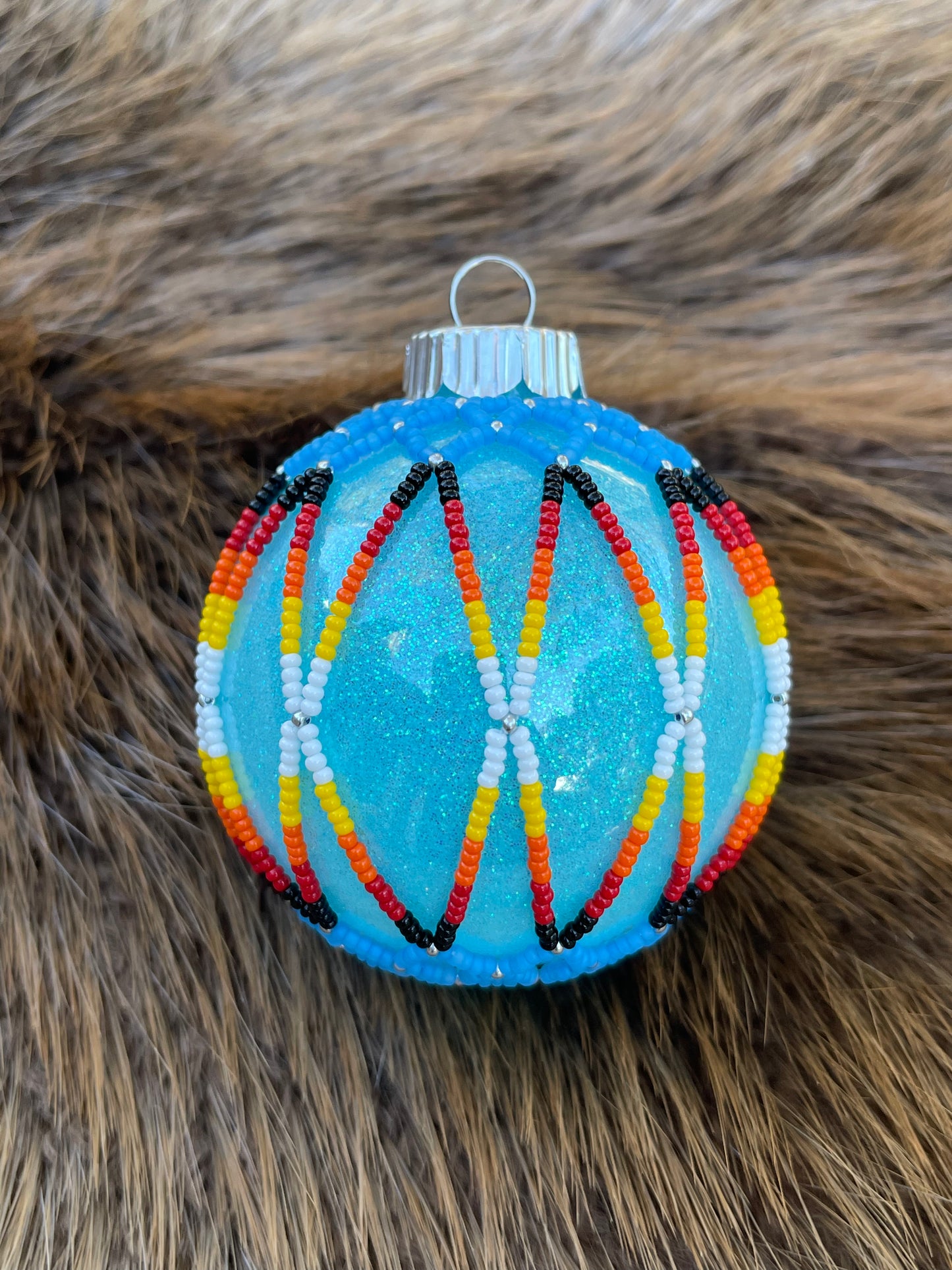 2.5” Plastic / Glittered on the inside