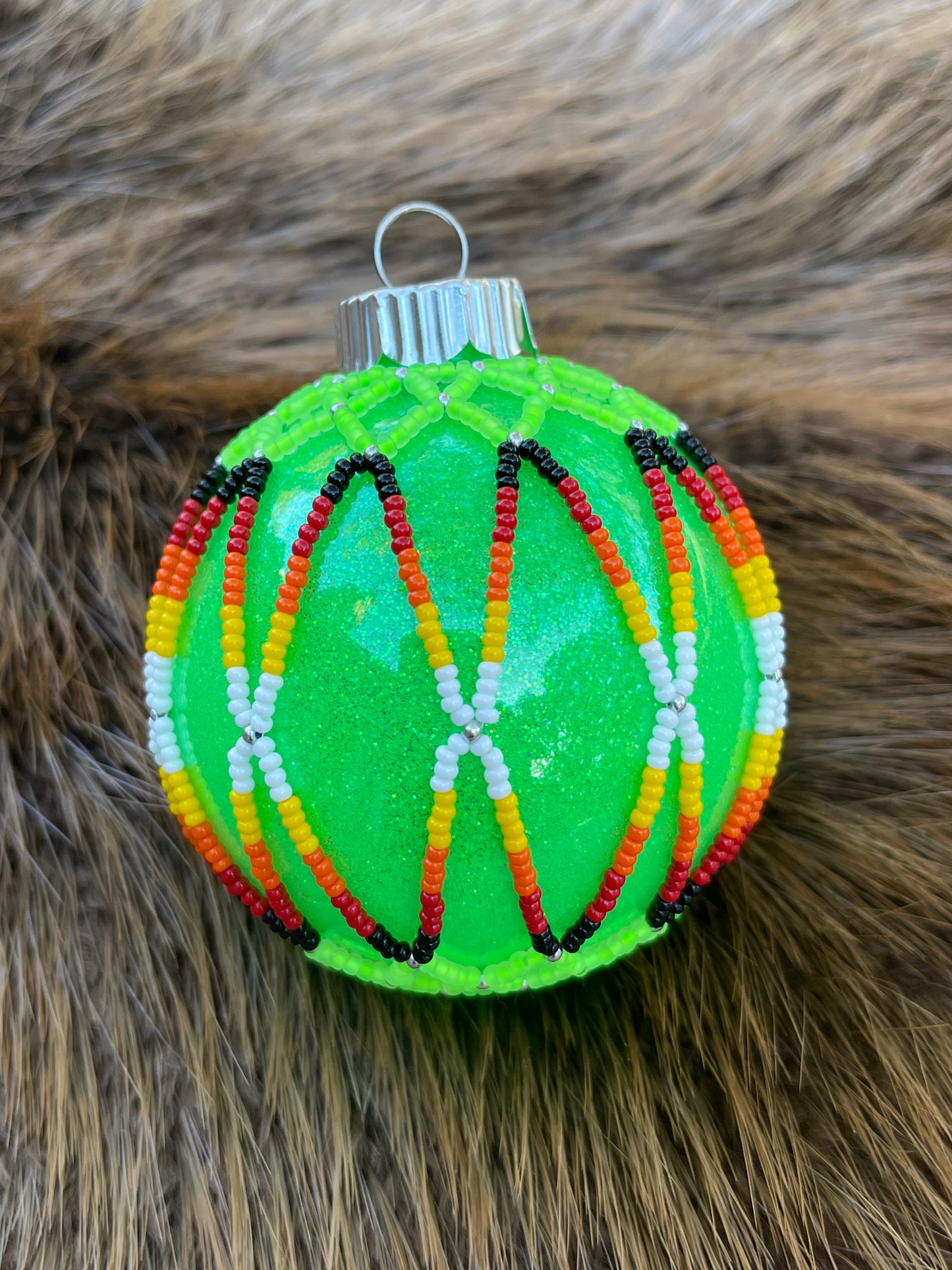 2.5” Plastic / Glittered on the inside