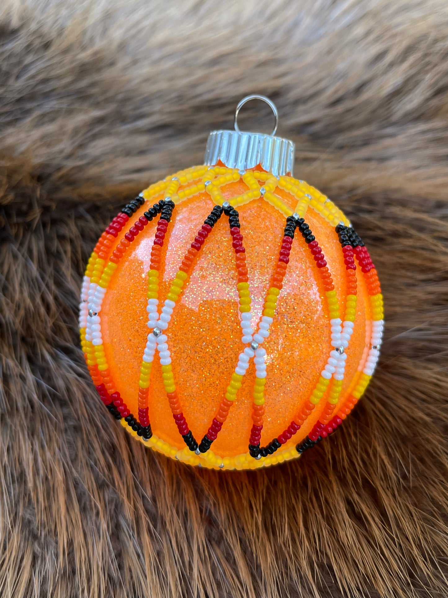 2.5” Plastic / Glittered on the inside